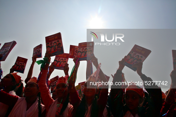 Bangladeshi Students receive free textbooks from government to celebrate on the first day of the New Year in Dhaka on January 1, 2020. The B...