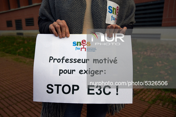 The paper reads 'Teacher eager to demand : stop E3C!'. High school teachers gathered in front of the Board of Education of Haute Garonne. Th...