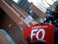 High school teachers gathered in front of the Board of Education of Haute Garonne. They throwed old schoolbooks in the backyard of the Board...