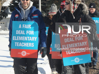 Ontario public elementary school teachers picket while striking on January 20, 2020 in Toronto, Ontario, Canada. All four major teachers uni...