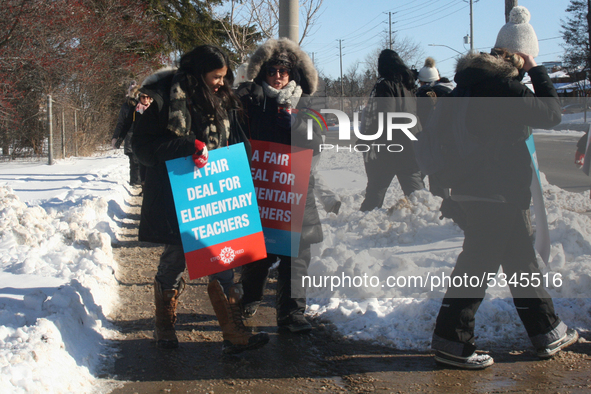 Ontario public elementary school teachers picket while striking on January 20, 2020 in Toronto, Ontario, Canada. All four major teachers uni...