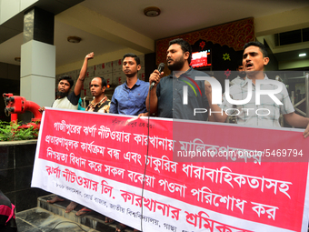 Garments workers of Jharna Knitwear Limited stage a demonstration in front of Department of Labor building demanding their due payment and e...