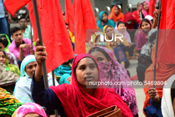 Garments workers of Jharna Knitwear Limited stage a demonstration in front of Department of Labor building demanding their due payment and e...