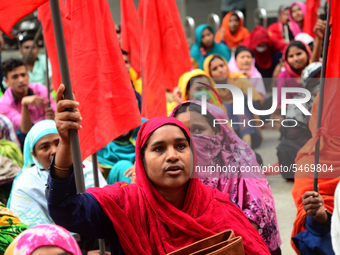 Garments workers of Jharna Knitwear Limited stage a demonstration in front of Department of Labor building demanding their due payment and e...