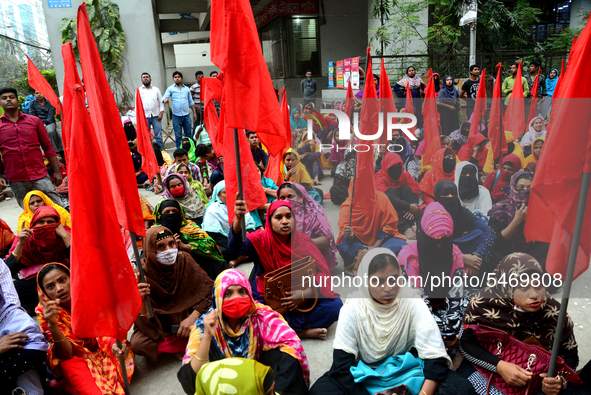 Garments workers of Jharna Knitwear Limited stage a demonstration in front of Department of Labor building demanding their due payment and e...