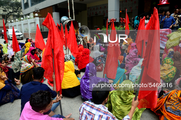 Garments workers of Jharna Knitwear Limited stage a demonstration in front of Department of Labor building demanding their due payment and e...