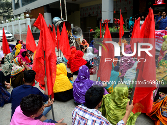 Garments workers of Jharna Knitwear Limited stage a demonstration in front of Department of Labor building demanding their due payment and e...