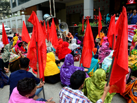 Garments workers of Jharna Knitwear Limited stage a demonstration in front of Department of Labor building demanding their due payment and e...