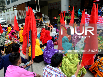 Garments workers of Jharna Knitwear Limited stage a demonstration in front of Department of Labor building demanding their due payment and e...