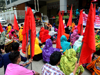 Garments workers of Jharna Knitwear Limited stage a demonstration in front of Department of Labor building demanding their due payment and e...