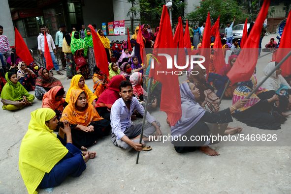 Garments workers of Jharna Knitwear Limited stage a demonstration in front of Department of Labor building demanding their due payment and e...