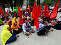 Garments workers of Jharna Knitwear Limited stage a demonstration in front of Department of Labor building demanding their due payment and e...