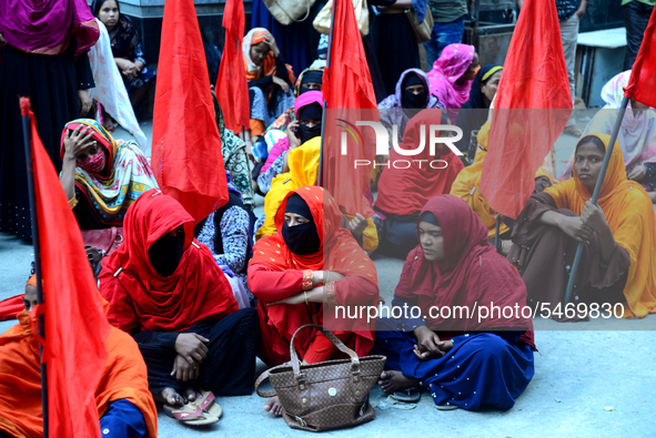 Garments workers of Jharna Knitwear Limited stage a demonstration in front of Department of Labor building demanding their due payment and e...