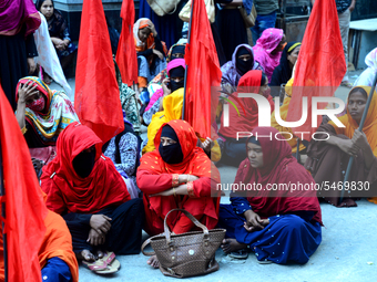 Garments workers of Jharna Knitwear Limited stage a demonstration in front of Department of Labor building demanding their due payment and e...