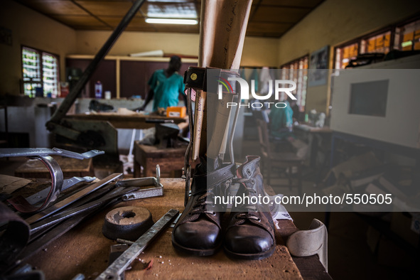 Prosthetic boots for children in the Bombuaka workshop of prostheses, Togo 