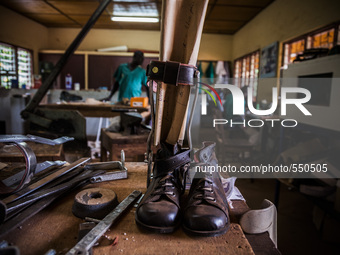 Prosthetic boots for children in the Bombuaka workshop of prostheses, Togo (