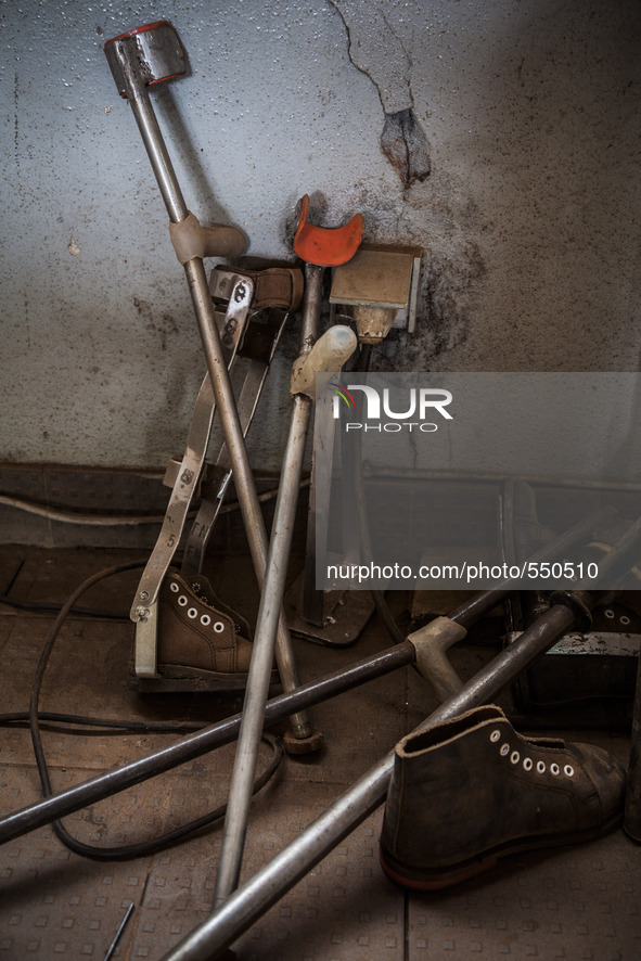 Prosthetic boots and crutches for children in the Bombuaka workshop of prostheses, Togo 