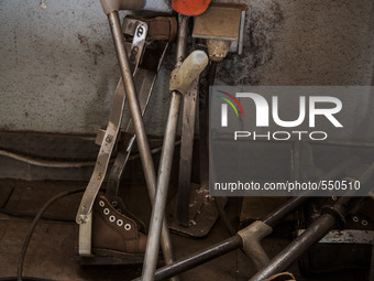 Prosthetic boots and crutches for children in the Bombuaka workshop of prostheses, Togo (