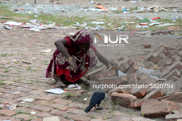 Bangladeshi woman daily labor works in a contraction site in Dhaka, Bangladesh, on March 7, 2020. Each woman labor earn 4.71 US dollar or 40...