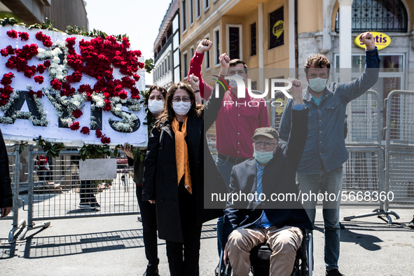 Syndicate members holding a wreath in order to lay it on the Taksim square Freedom monument for the May Day celebrations on 1 May, 2020, in...