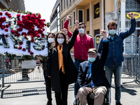 Syndicate members holding a wreath in order to lay it on the Taksim square Freedom monument for the May Day celebrations on 1 May, 2020, in...