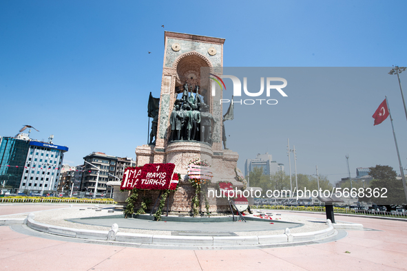 Syndicate members holding a wreath in order to lay it on the Taksim square Freedom monument for the May Day celebrations  on 1 May, 2020, in...