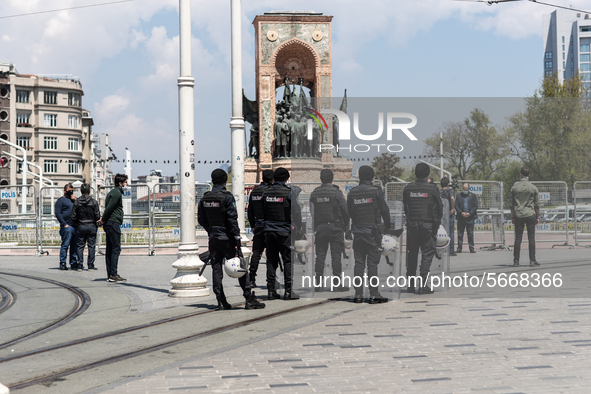 Police officers block the Taksim square Freedom monument for the May Day celebrations  on 1 May, 2020, in Istanbul, Turkey, during the coron...