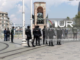 Police officers block the Taksim square Freedom monument for the May Day celebrations  on 1 May, 2020, in Istanbul, Turkey, during the coron...