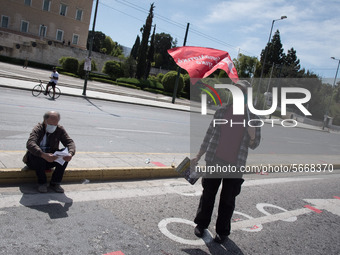 People wearing mask protest on International Worker's Day during the curfew due to Coronavirus (Covid-19) pandemic in Athens, Greece on May...