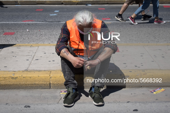 People wearing mask protest on International Worker's Day during the curfew due to Coronavirus (Covid-19) pandemic in Athens, Greece on May...