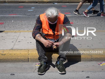 People wearing mask protest on International Worker's Day during the curfew due to Coronavirus (Covid-19) pandemic in Athens, Greece on May...