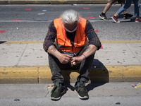 People wearing mask protest on International Worker's Day during the curfew due to Coronavirus (Covid-19) pandemic in Athens, Greece on May...