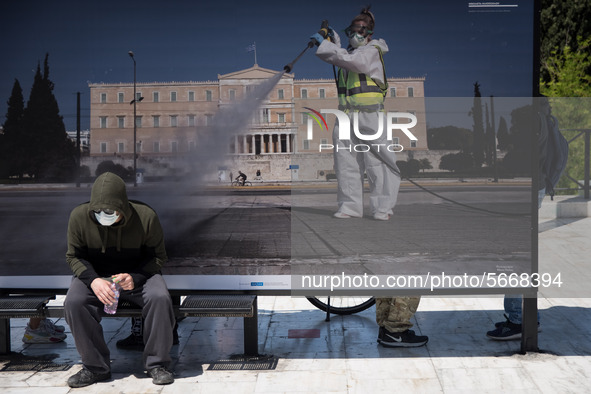 People wearing mask protest on International Worker's Day during the curfew due to Coronavirus (Covid-19) pandemic in Athens, Greece on May...