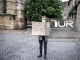 May Day in Bordeaux France, on May 1, 2020, a small group of people demonstrate in the street during the confinement before being checked by...