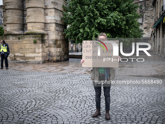 May Day in Bordeaux France, on May 1, 2020, a small group of people demonstrate in the street during the confinement before being checked by...