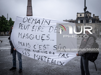 May Day in Bordeaux France, on May 1, 2020, a small group of people demonstrate in the street during the confinement before being checked by...