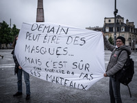 May Day in Bordeaux France, on May 1, 2020, a small group of people demonstrate in the street during the confinement before being checked by...