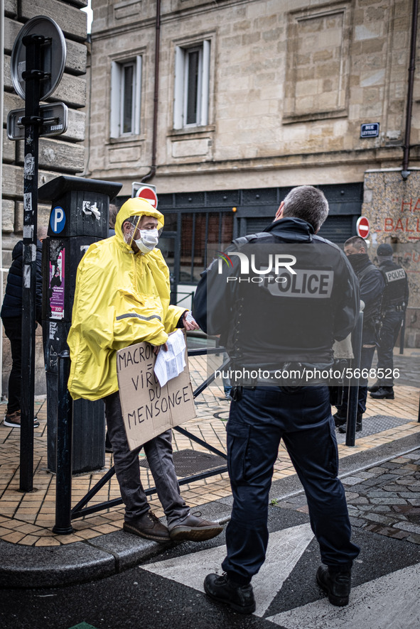 Police check people demonstrating for May Day in Bordeaux, France, on May 1, 2020 during lockdown. 