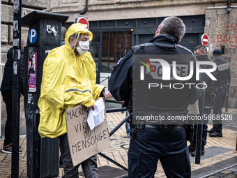 Police check people demonstrating for May Day in Bordeaux, France, on May 1, 2020 during lockdown. (