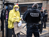 Police check people demonstrating for May Day in Bordeaux, France, on May 1, 2020 during lockdown. (