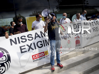 Employees from NISSAN and subcontractors fill a Renault dealership with signs and cut off the access motorway to Barcelona protest in Barcel...