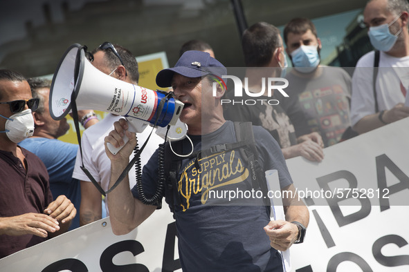 Employees from NISSAN and subcontractors fill a Renault dealership with signs and cut off the access motorway to Barcelona protest in Barcel...