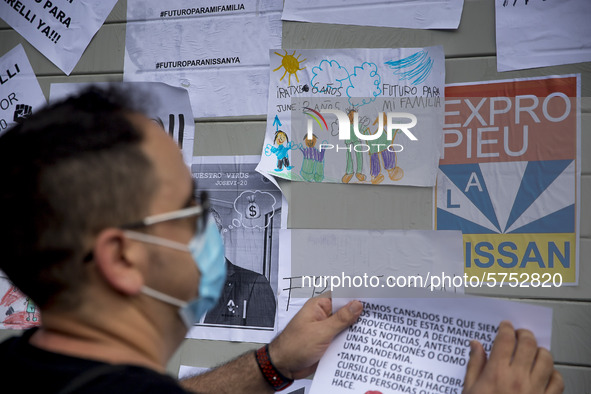 Employees from NISSAN and subcontractors fill a Renault dealership with signs and cut off the access motorway to Barcelona protest in Barcel...