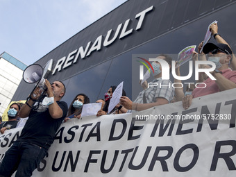 Employees from NISSAN and subcontractors fill a Renault dealership with signs and cut off the access motorway to Barcelona protest in Barcel...