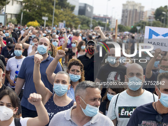 Employees from NISSAN and subcontractors fill a Renault dealership with signs and cut off the access motorway to Barcelona protest in Barcel...