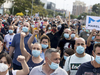 Employees from NISSAN and subcontractors fill a Renault dealership with signs and cut off the access motorway to Barcelona protest in Barcel...