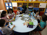 Palestinian children are pictured in a nursery school as it reopens after Palestinians ease the coronavirus disease (COVID-19) restrictions,...