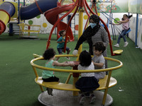 Palestinian children are pictured in a nursery school as it reopens after Palestinians ease the coronavirus disease (COVID-19) restrictions,...