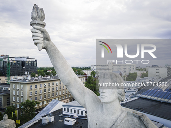 A sculpture on top of the main building of the Warsaw University of Technology, the Gmach Główny Politechniki Warszawskiej
is seen in Warsaw...