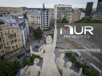 A sculpture on top of the main building of the Warsaw University of Technology, the Gmach Główny Politechniki Warszawskiej
is seen overlooki...